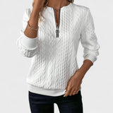 Minda - Naiste sviiter, millel on lukuga ja kudumisega palmikud